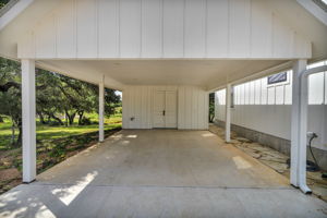 even the 2 car carport and storage reflect the high quality of this entire river property