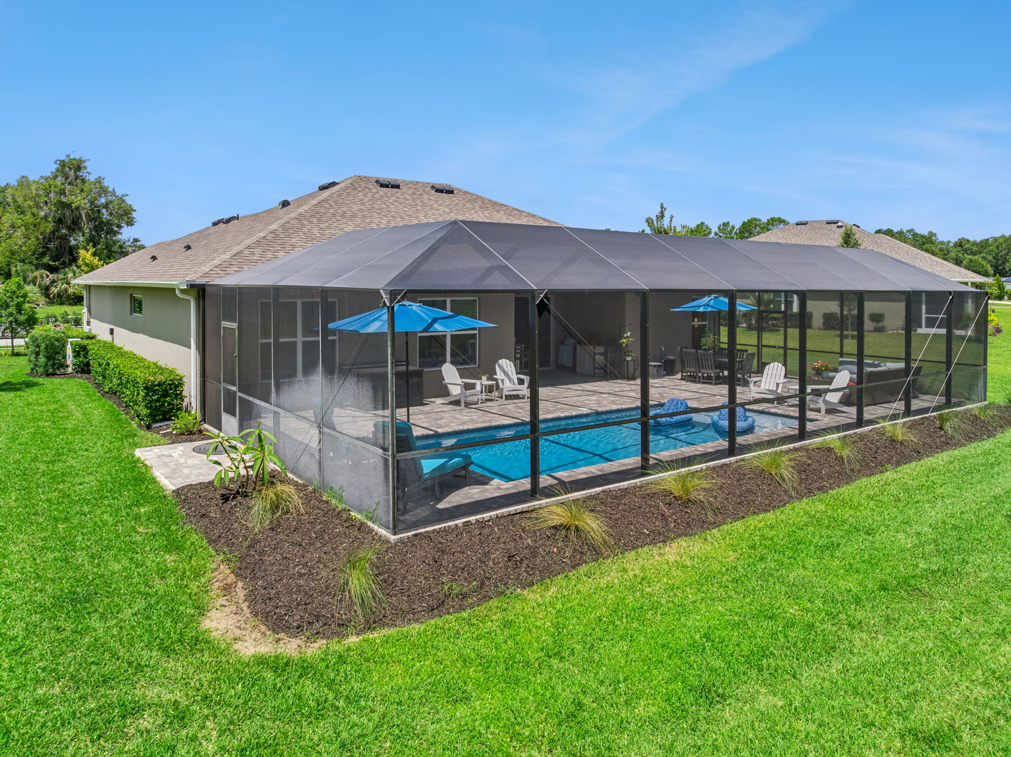 Pool positioned to maximize entertainment spaces