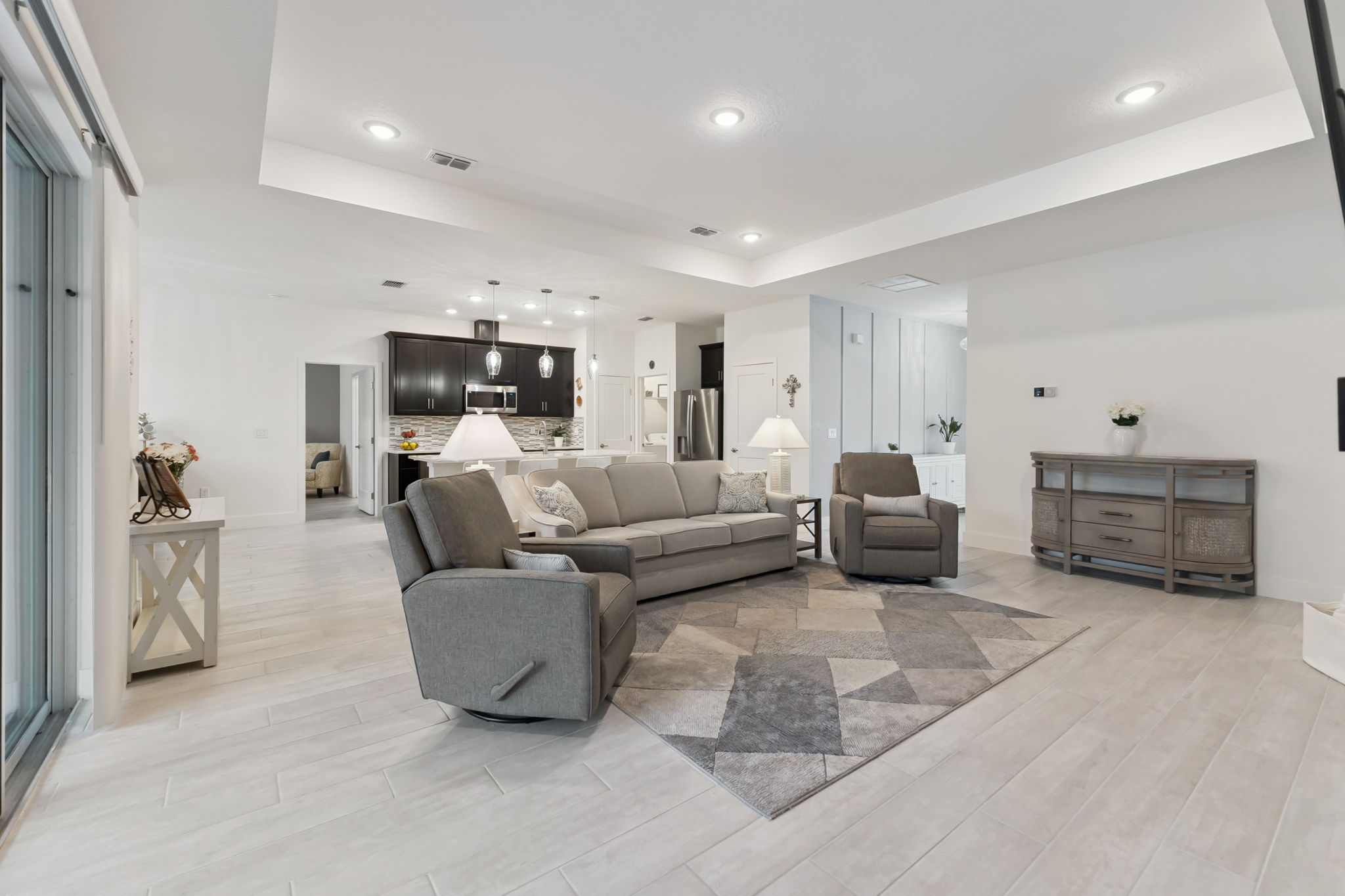 Spacious Living room with Tray Ceilings