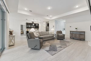 Spacious Living room with Tray Ceilings