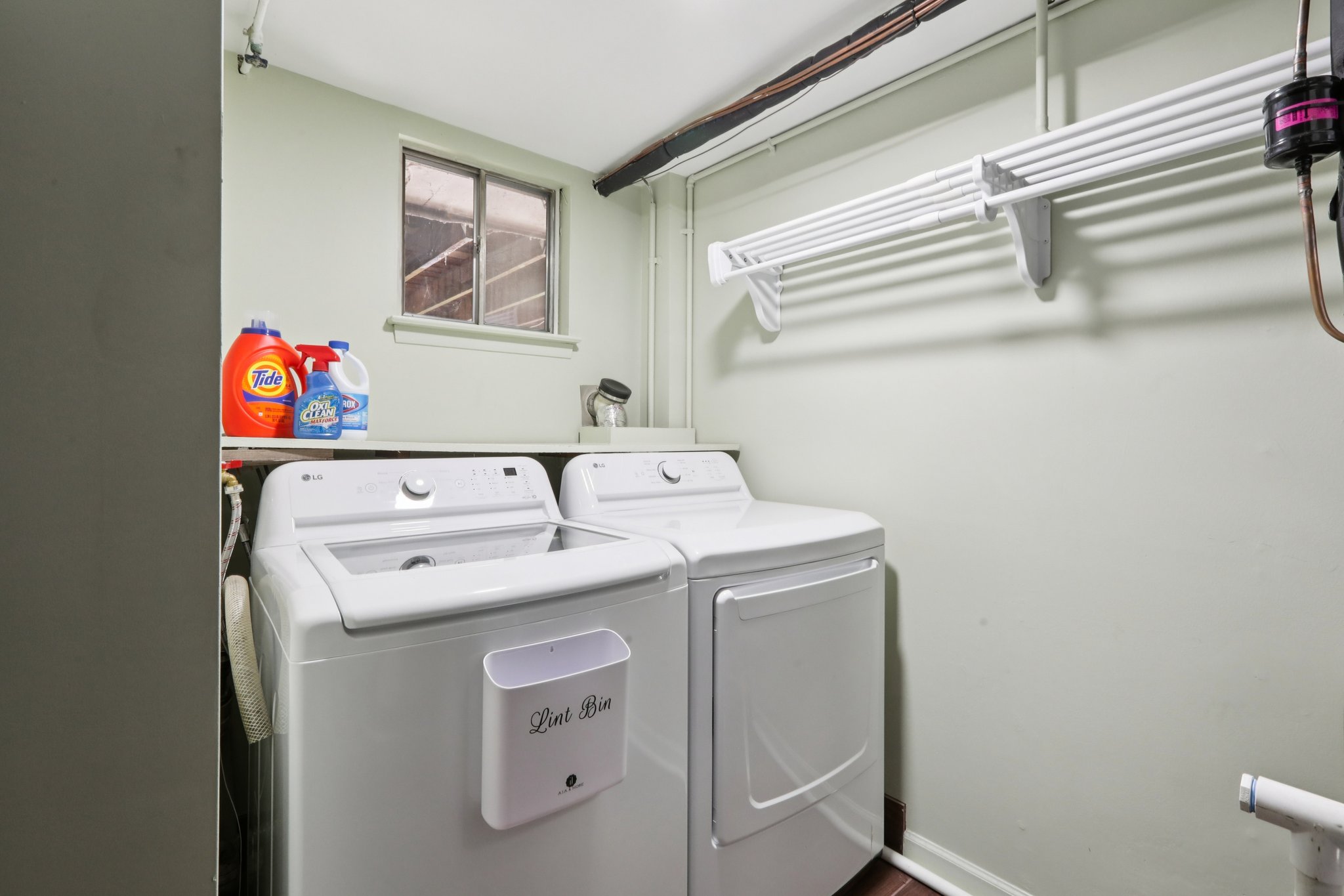 New washer & dryer less than a year old. Not visible room for coats, shoes, boots & mechanicals.
