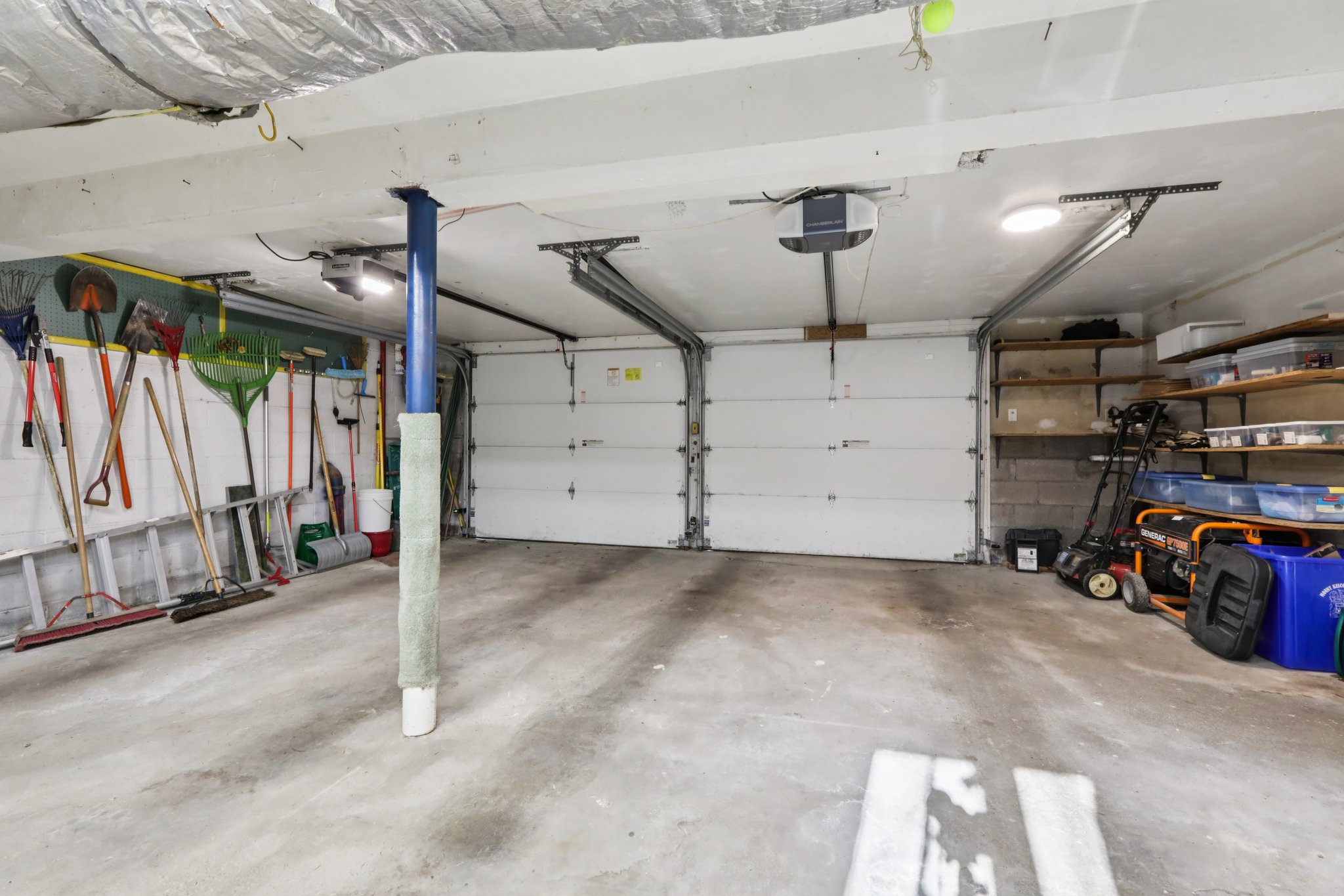 Oversized 2-car attached garage with new doors & openers; room for bikes and work bench, etc.