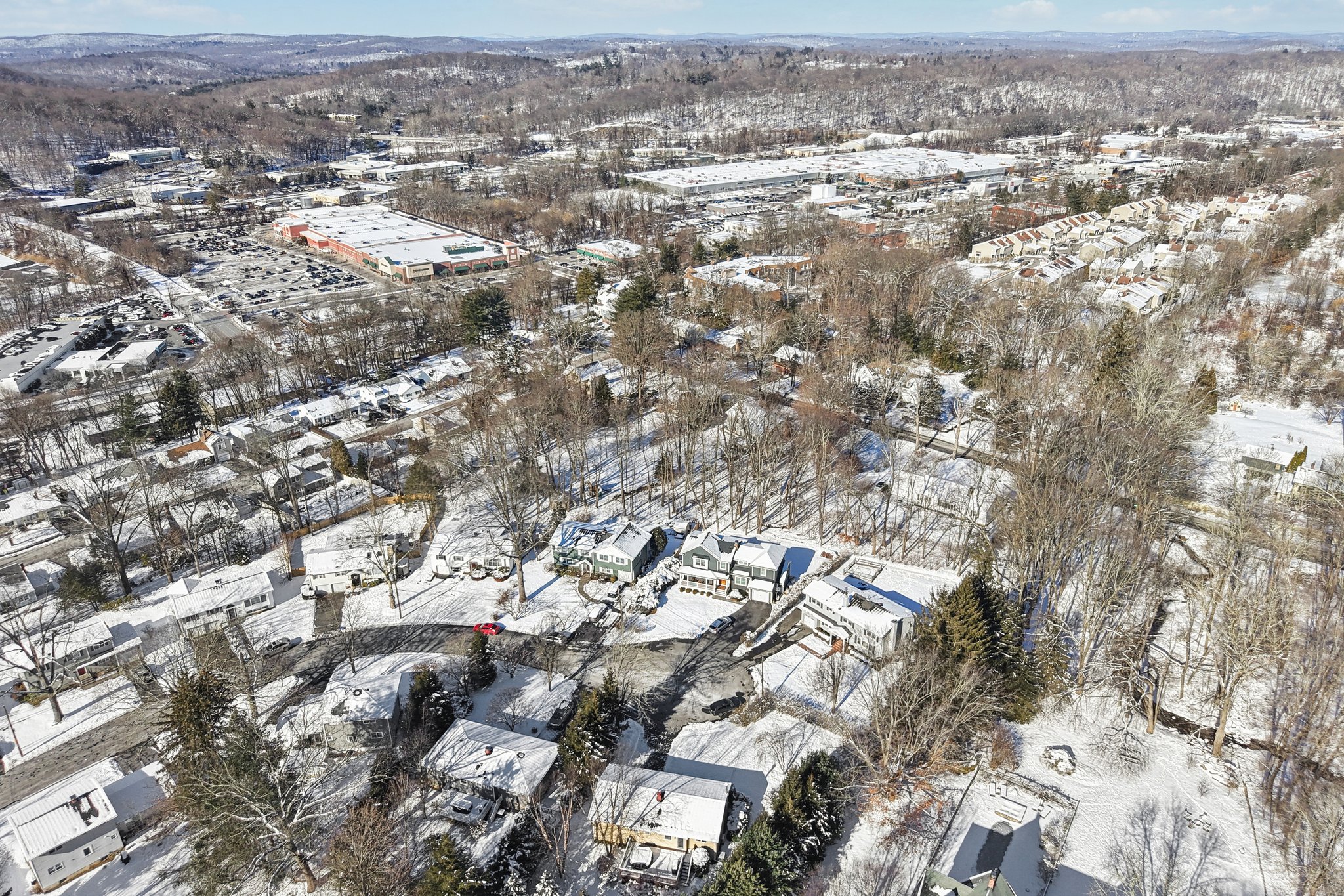 Another aerial view of the street showing the home at the end of the cul-de-sac.