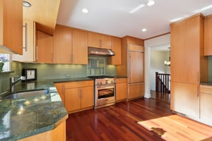 Notice the appliances - new gas stove top vented to the ext, electric oven below; custom door front refrigerator, pantry with custom shelves & pullouts.