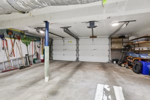 Oversized 2-car attached garage with new doors & openers; room for bikes and work bench, etc.