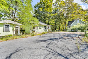 Property overview, shed on left, 21 in middle and 31 on right