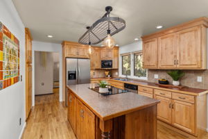 Lots of Cabinets and Pantry in Kitchen