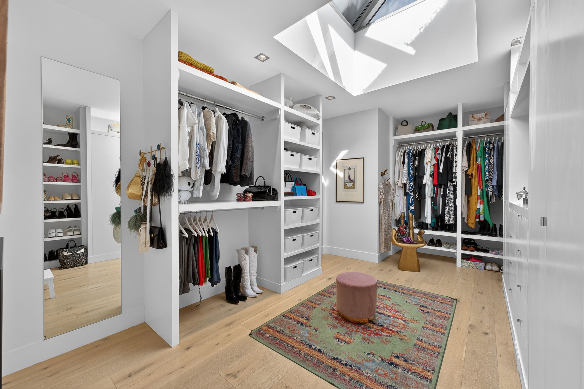 Custom walk-in closet with designed built-ins