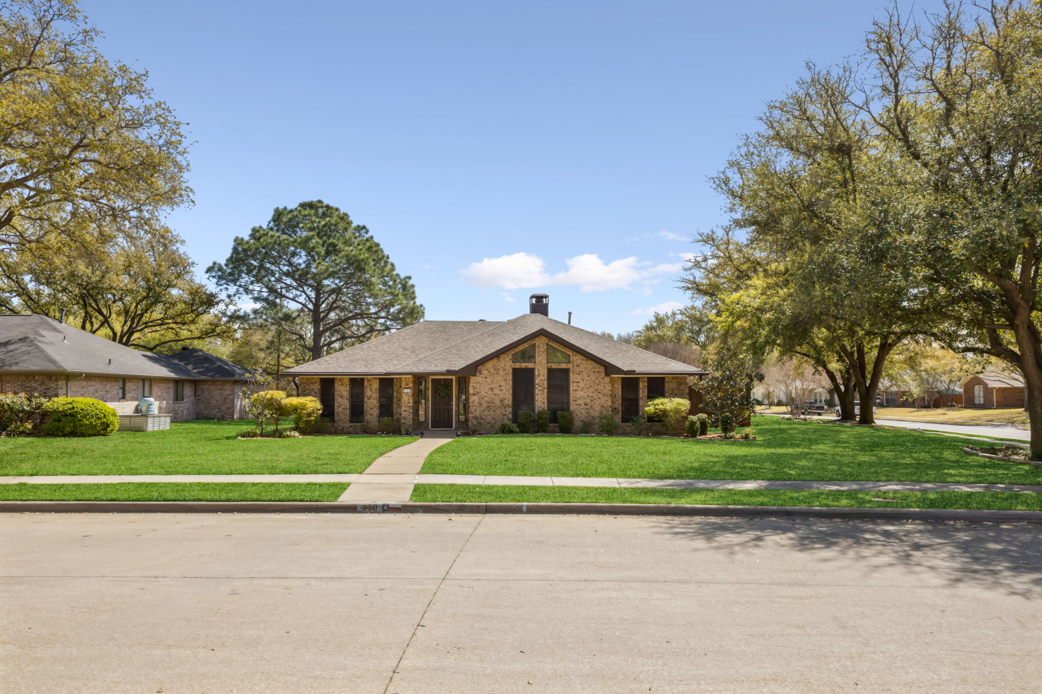 Lovely view of the yard and home!