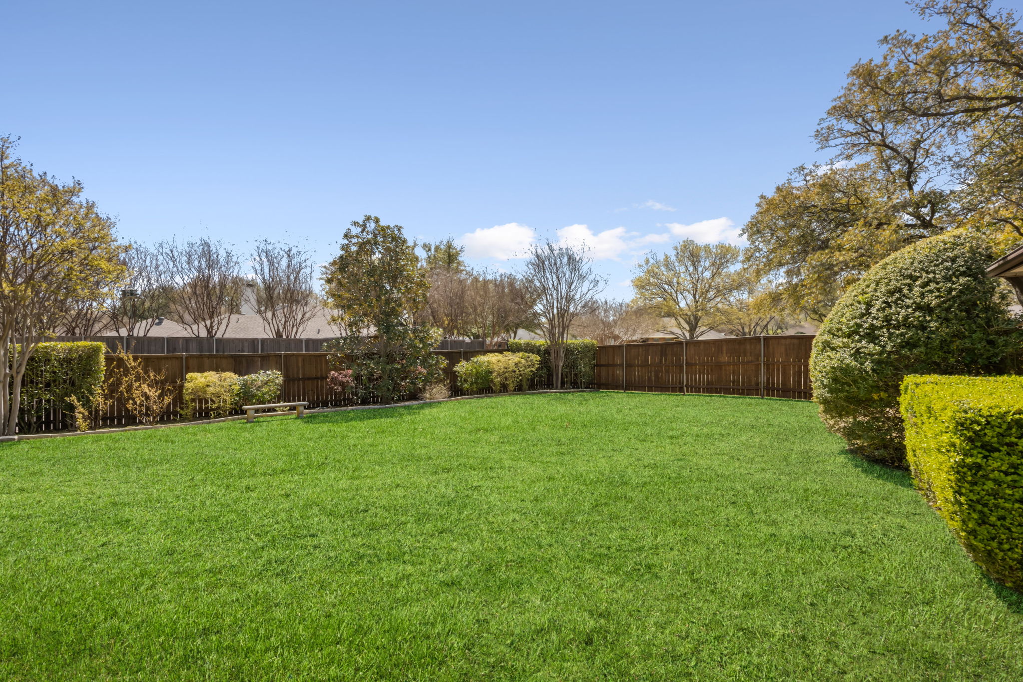This sizable backyard has endless possibilities for entertaining and family fun!