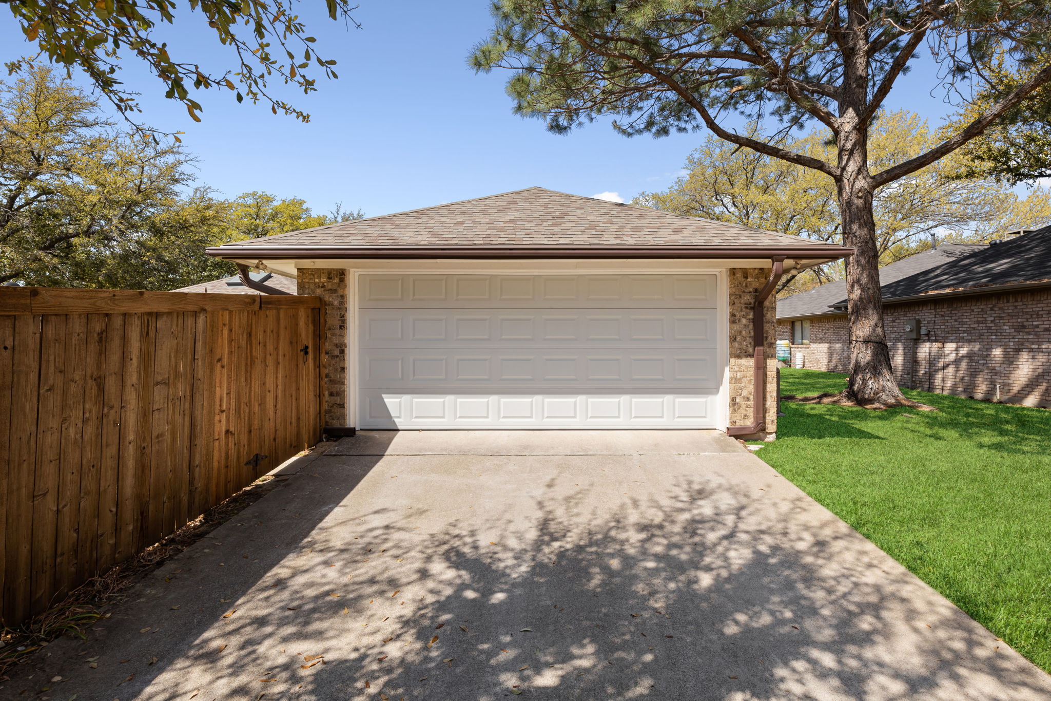 And now - the oversized Garage!  Don't miss the newly stained fence!