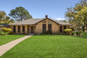 Beautifully Landscaped - Inviting Drive up!