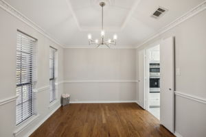 To the left as you enter the home is this AMAZING formal Dining Area!  Warm colors and NEW lighting!