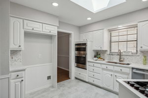 Stylish Backsplash and NEW Oven, Microwave and Dishwasher - Check out the NEW Flooring, too!  And you won't want to miss the High-end Skylight!