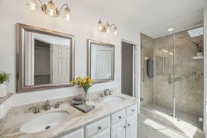 Lovely view of the New Mirrors - tasteful Lighting  - And Impressive Master Walk- In Shower!