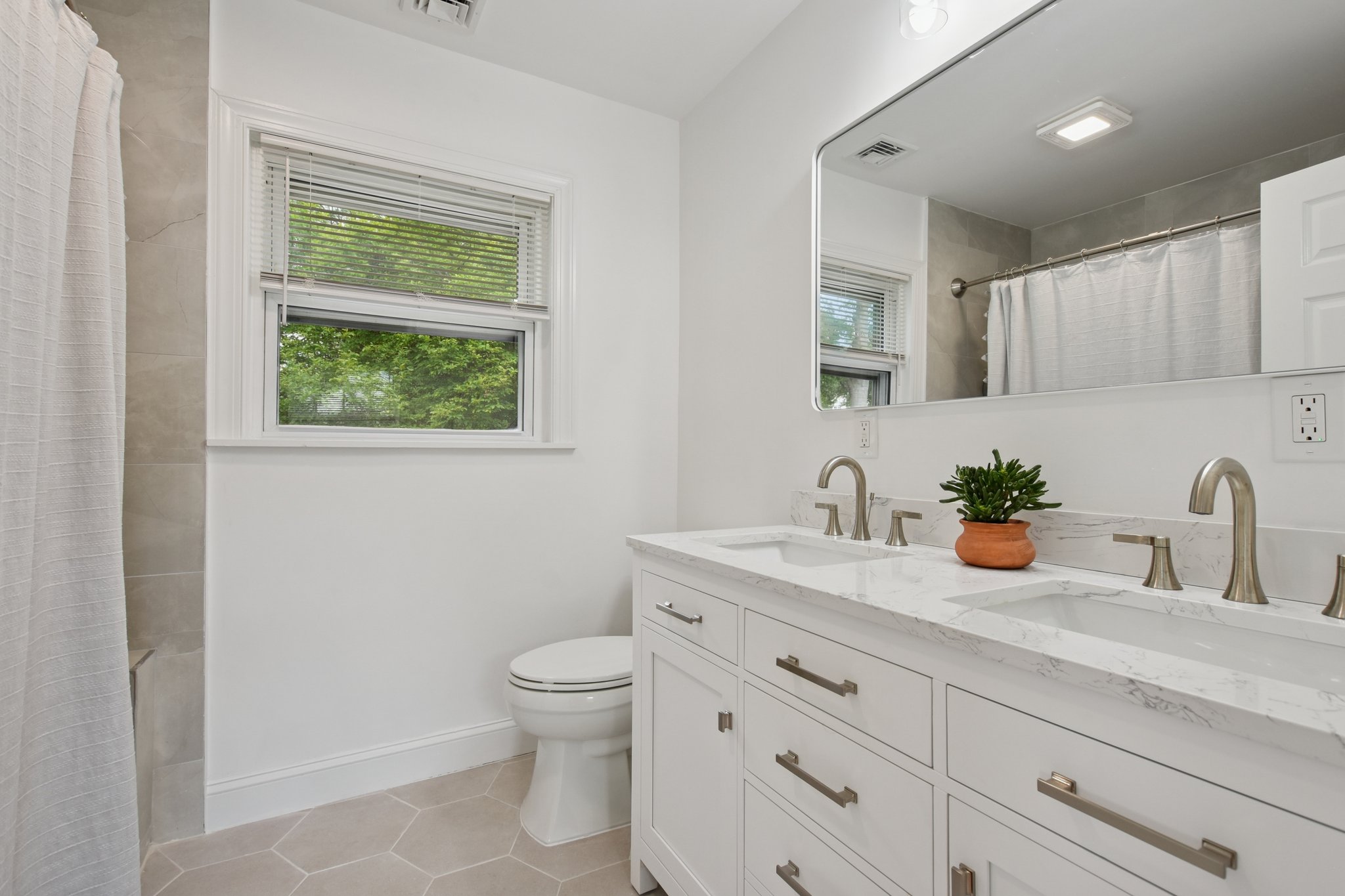 Primary bath with double sink.