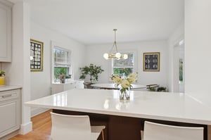 Where the smell of no-knead focaccia (King Arthur Baking's 2025 Recipe of the Year) mingles with the sound of laughter. This open kitchen–dining space is made for second helpings, spontaneous toasts, and being right in the middle of everything.