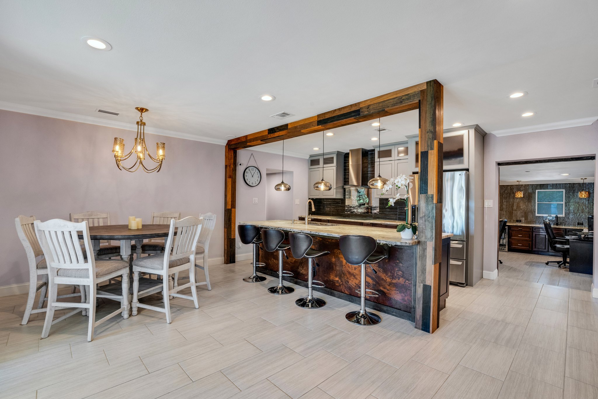 Dining Room with Open Kitchen, Matching Tile Floors Throughout