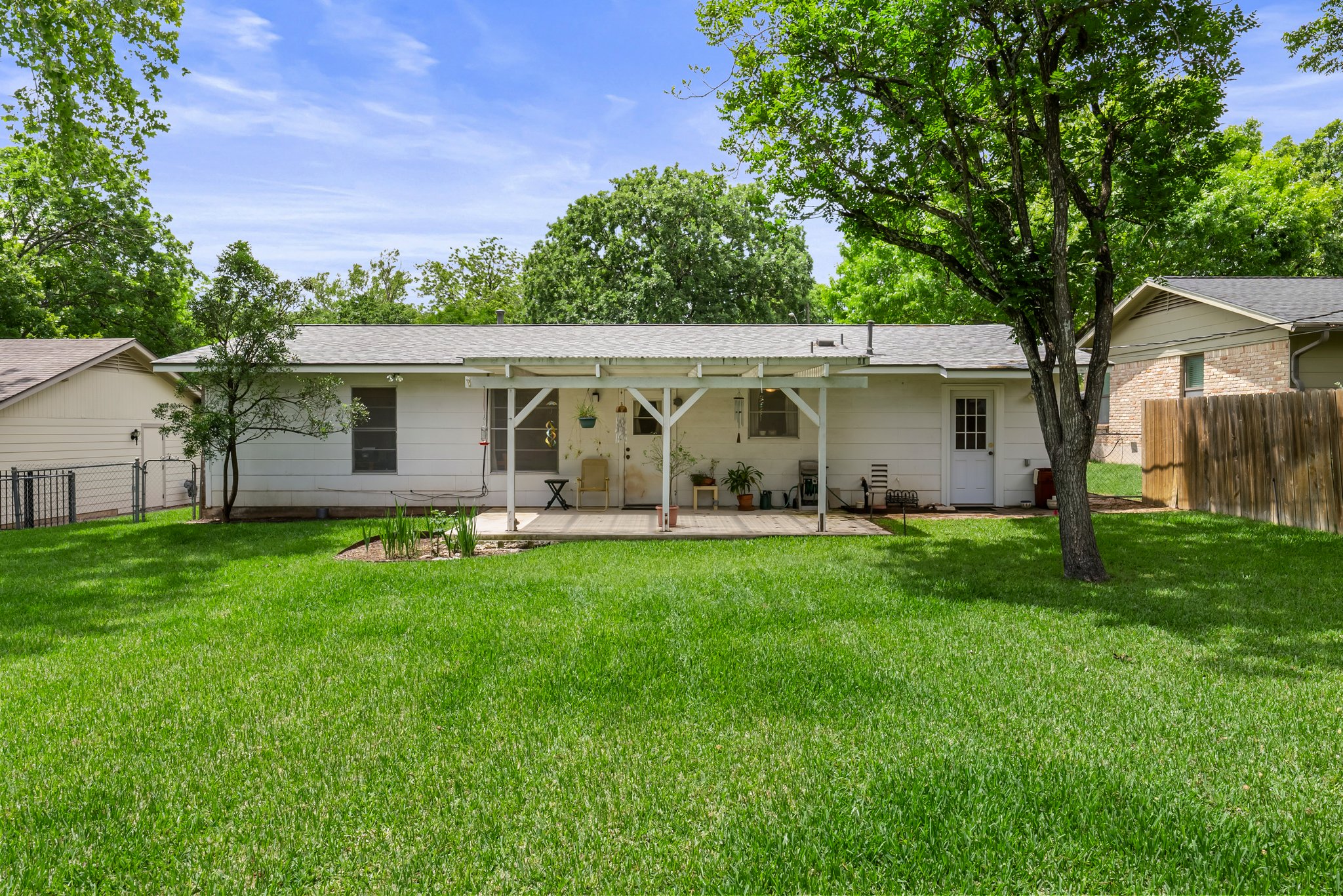 Back of the house with a large patio.