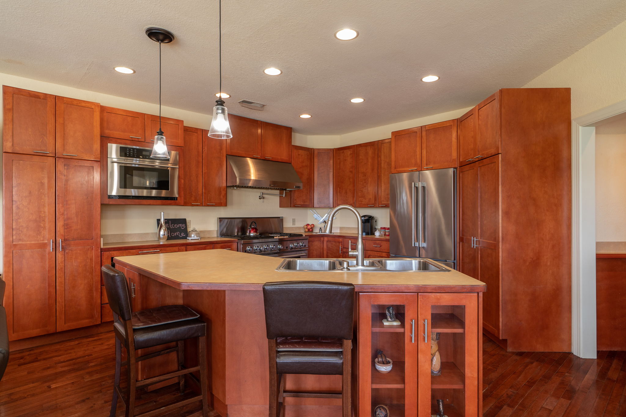 Kitchen boasts a new fridge and dishwasher.