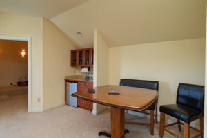 Upstairs has three rooms, the main area has a wet bar.