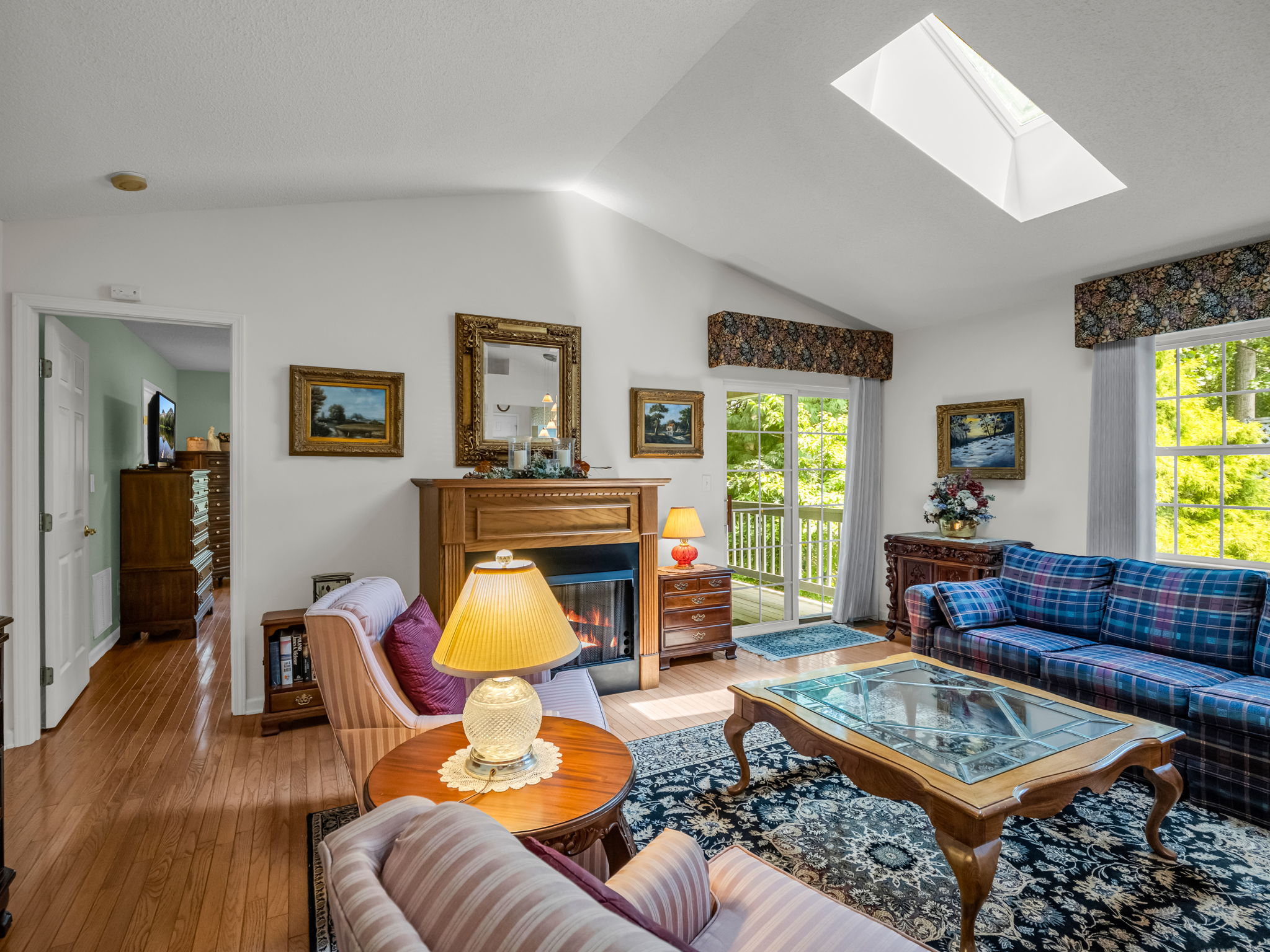 Living room with entry to Primary BR
