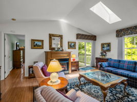Living room with entry to Primary BR
