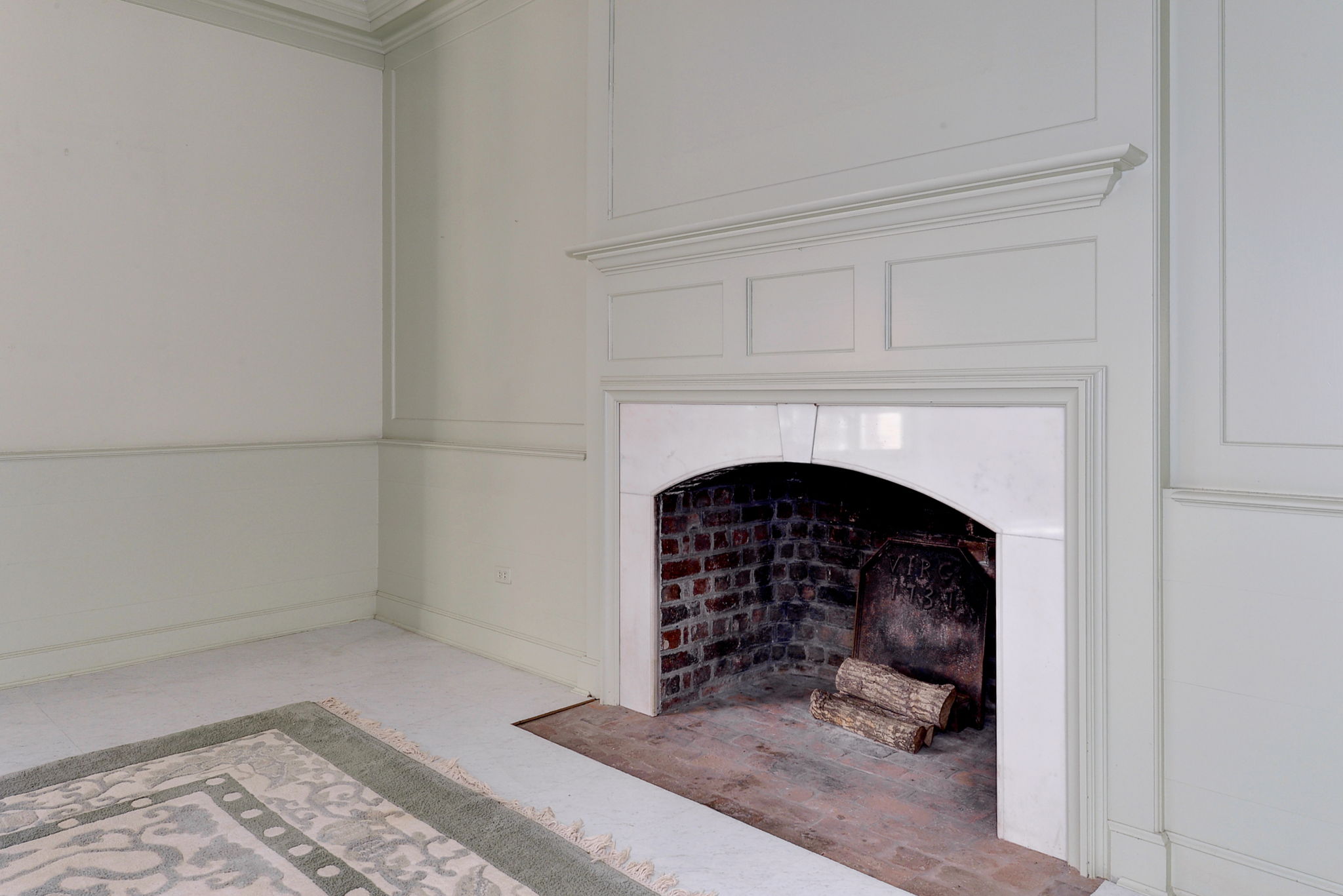 Living Room - Arched Marble Fireplace