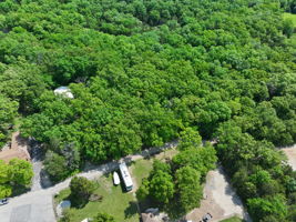 This parcel is surrounded by woods and offers incredible access to the back acre network of trails.