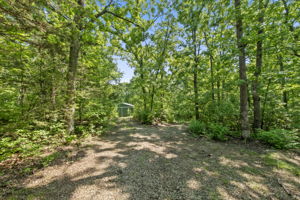 The parcel is extremely lush and quiet with a comfortable walking grade and beautiful shade trees.