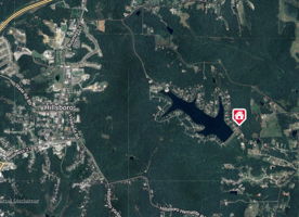 Block A, Lots 55 & 56 is nestled in a quiet corner on the North Side of the lake near the dam.
