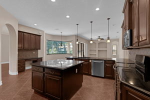 Dream Kitchen! 42" Maple Cabinets, Granite Countertops, Island, S/S Appliances, Central Vac with Floor Sweep