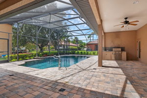 Enclosed Pool with Fountain, Covered Lanai with Pavers, Summer Kitchen
