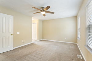 Oversized and peaceful primary bedroom.