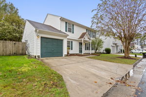 Charming exterior with landscaping