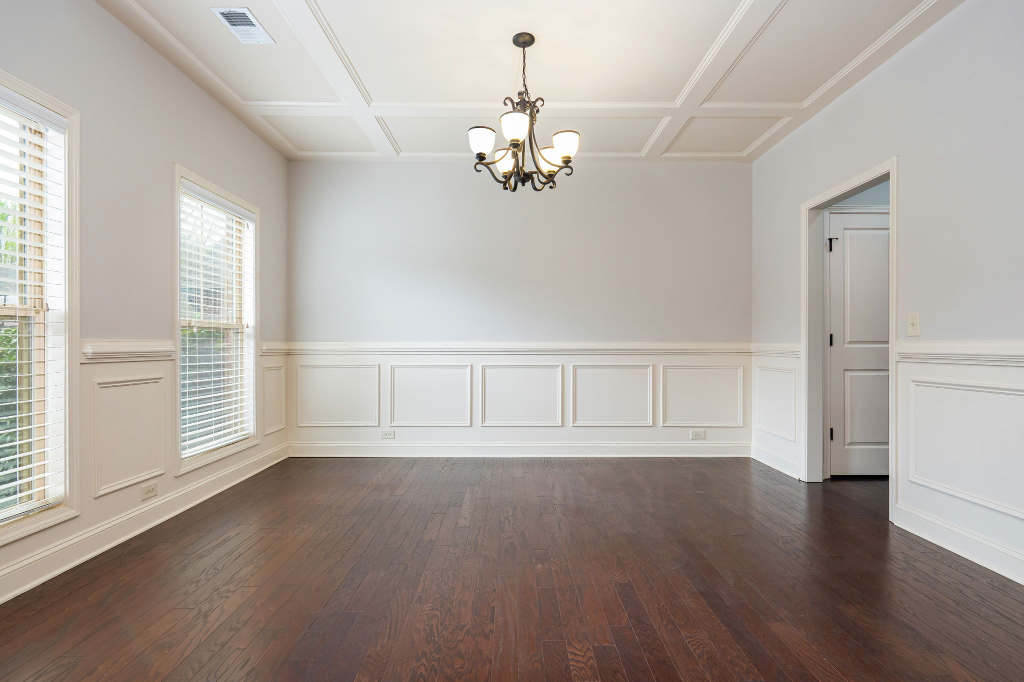 Dining Rm w Coffered ceiling.