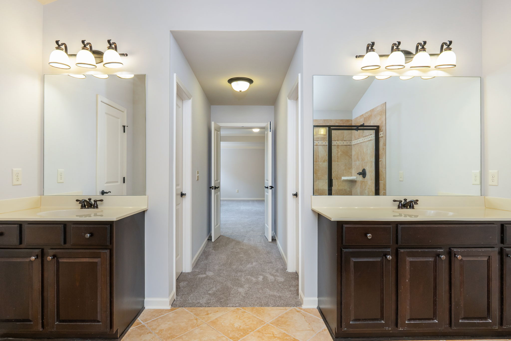 his & Her Sinks along w 2-closets