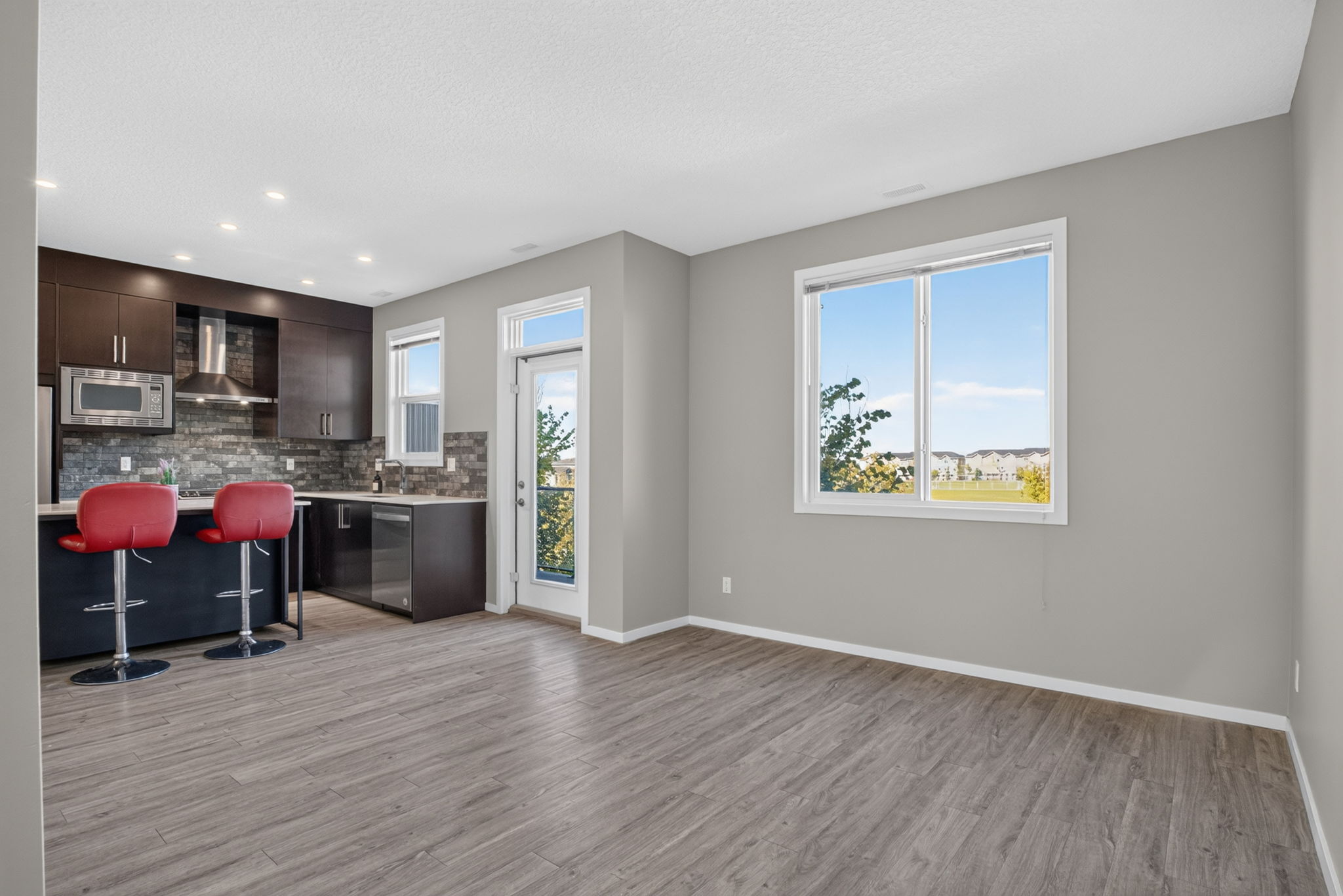 Open main floor flooded with natural light