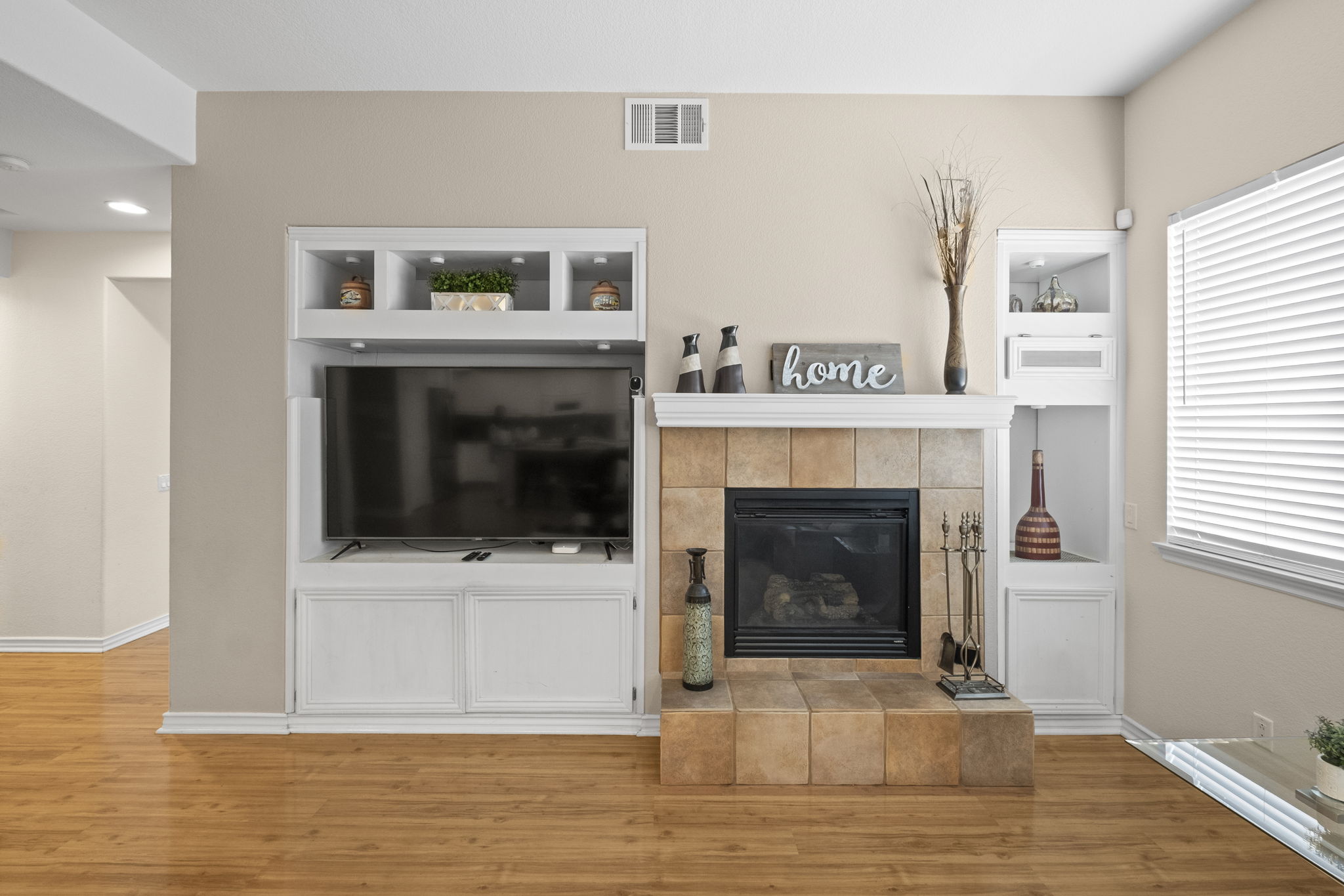 31534 Borega Rd, Murrieta, CA 92563 -Open‑concept kitchen and living room with fireplace
