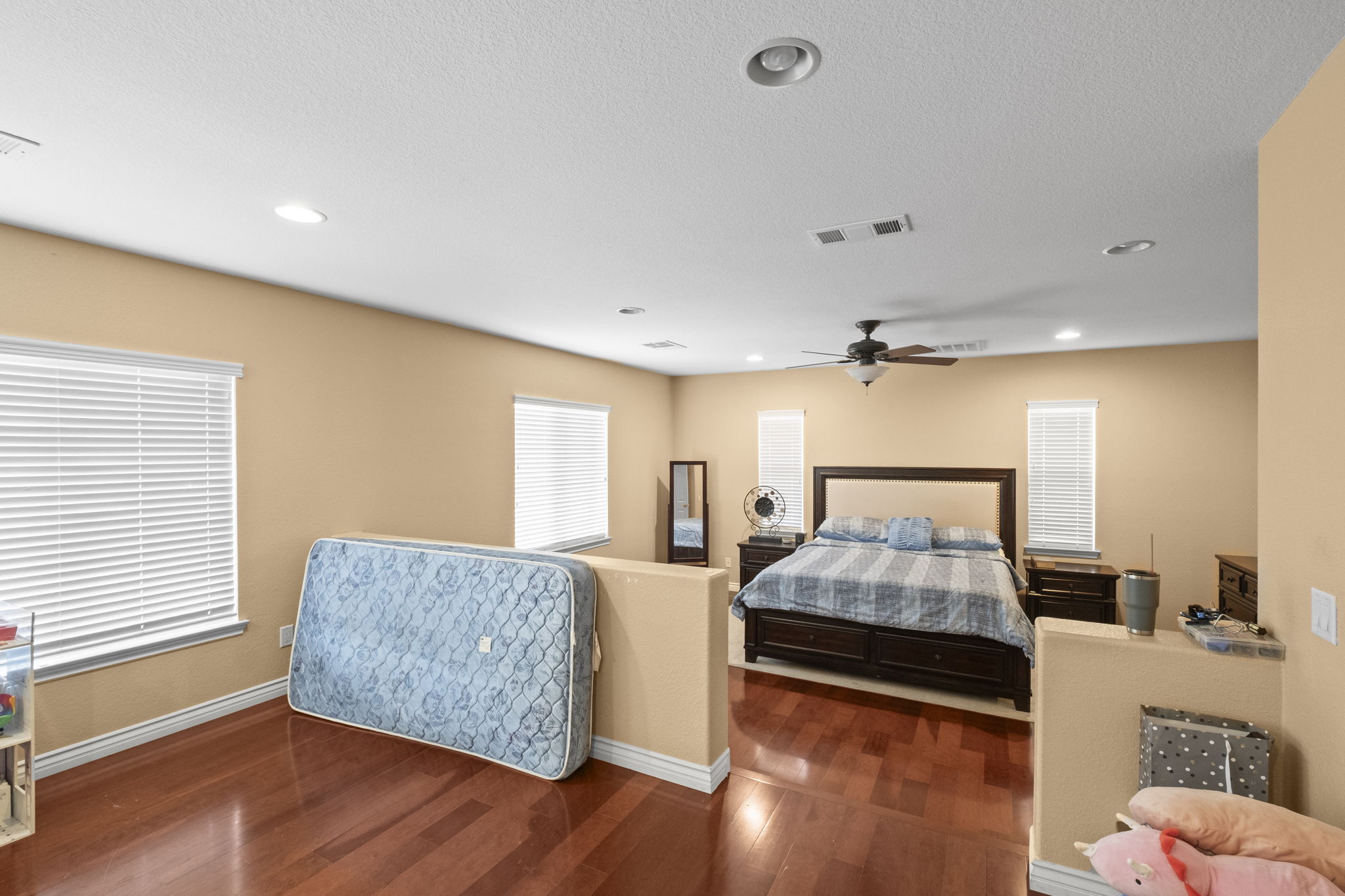 31534 Borega Rd, Murrieta, CA 92563 - Large primary bedroom with a well‑appointed ensuite, with fireplace
