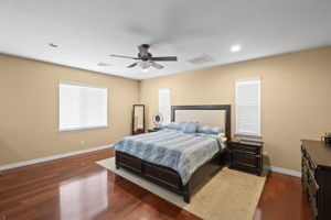 31534 Borega Rd, Murrieta, CA 92563 - Large primary bedroom with a well‑appointed ensuite, offering comfort and privacy.