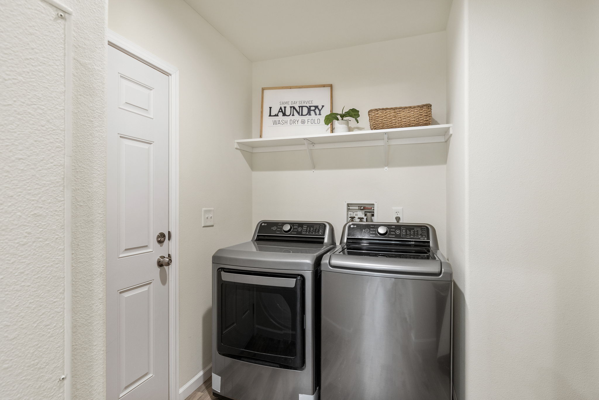 Laundry and door to backyard.