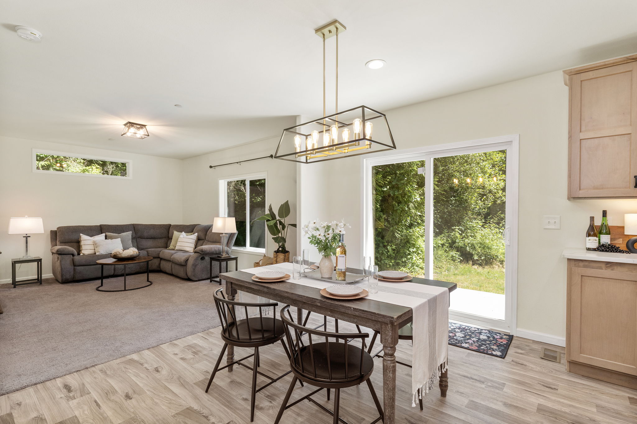 Dining room with slider to back patio and private backyard!
