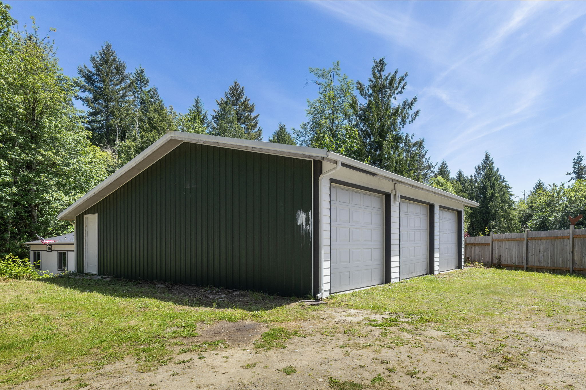 36x36 1,296 sqft  insulated and powered 3-car garage or workshop with 200 amp service!