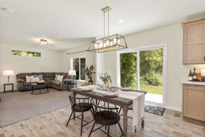 Dining room with slider to back patio and private backyard!