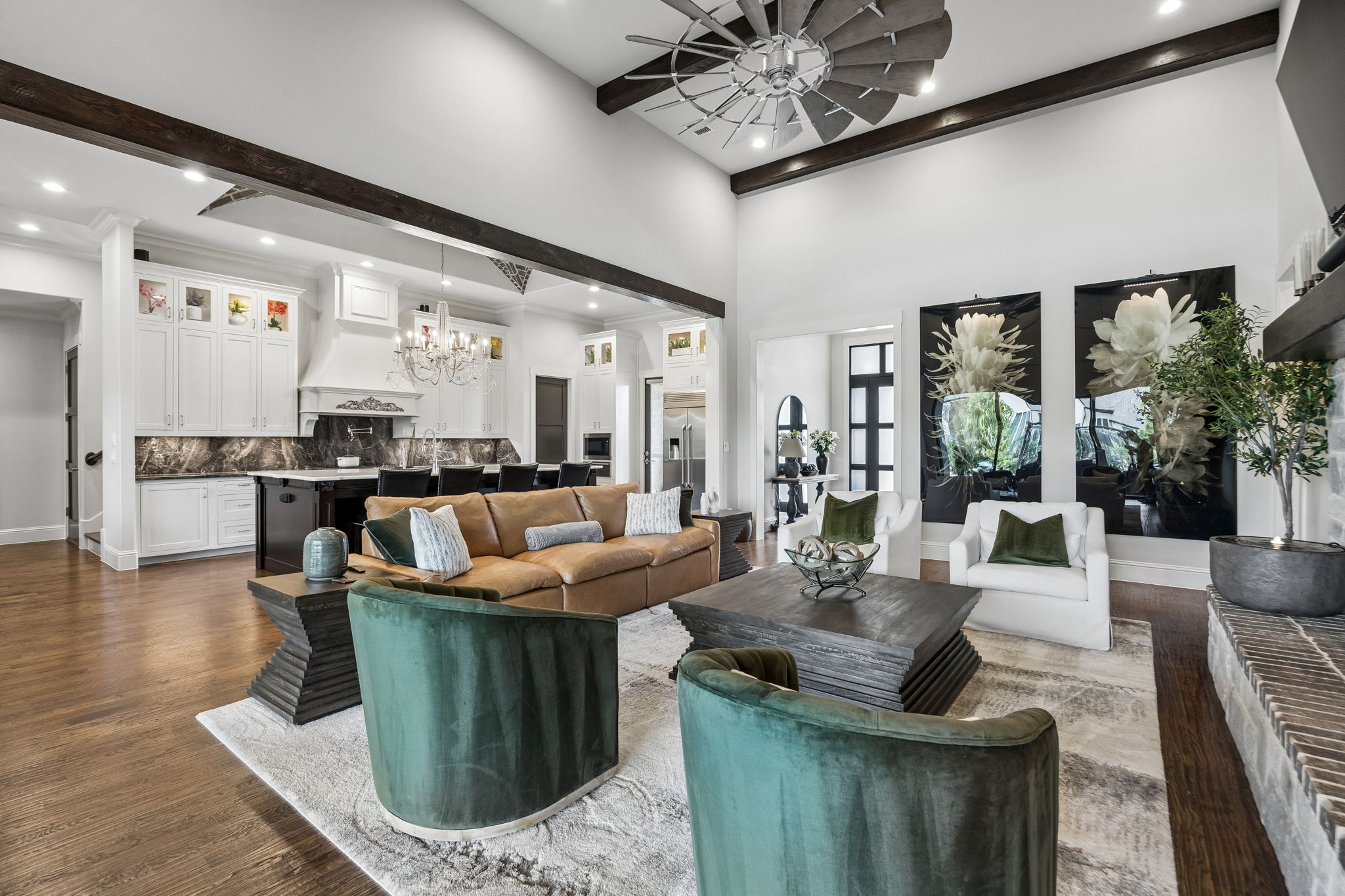 A True Chef’s Kitchen Connection – The wide opening between the great room and kitchen keeps the main living spaces connected, allowing conversation, entertaining, and daily routines to flow comfortably from one area to the next.