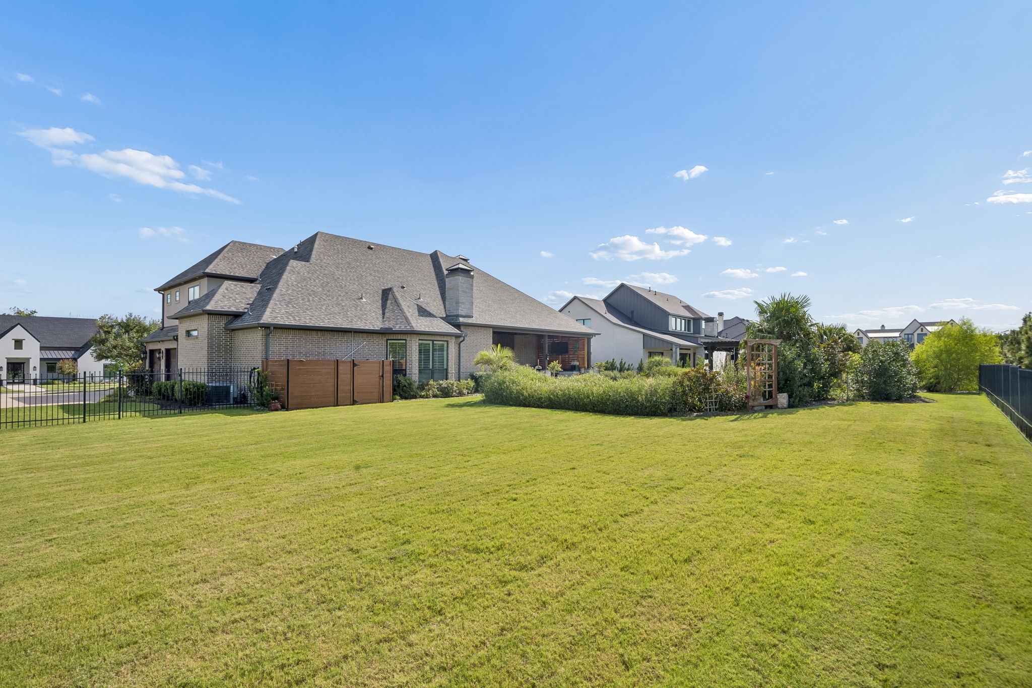 An Expansive Homesite with Room to Breathe – The generous lot provides a broad lawn, established landscaping, and meaningful separation around the home while preserving space for the pool and outdoor living areas.