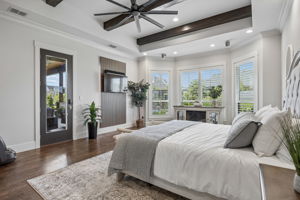 Private Access to the Covered Terrace – A glass door connects the primary suite directly to the outdoor living area, making it easy to step outside for morning coffee, fresh air, or a quiet view of the pool.