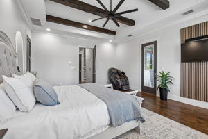 Room to Unwind – The expansive primary suite provides space for a substantial bed, additional seating, and direct access to the bath, closet, and terrace without feeling crowded.