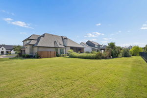 An Expansive Homesite with Room to Breathe – The generous lot provides a broad lawn, established landscaping, and meaningful separation around the home while preserving space for the pool and outdoor living areas.